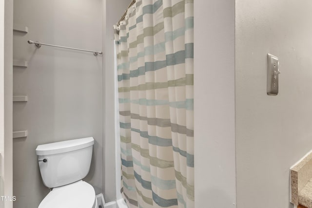 4658 Fawnbrook Cir, Raleigh, NC 27612 - bathroom with toilet and curtained shower