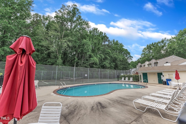 4658 Fawnbrook Cir, Raleigh, NC 27612 - community pool featuring a patio area