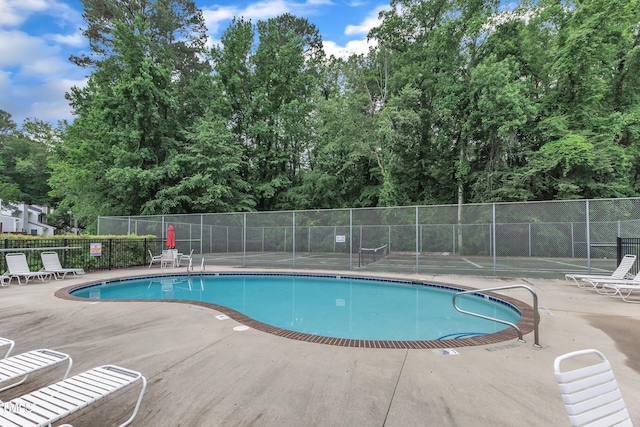 4658 Fawnbrook Cir, Raleigh, NC 27612 - community pool featuring a patio area