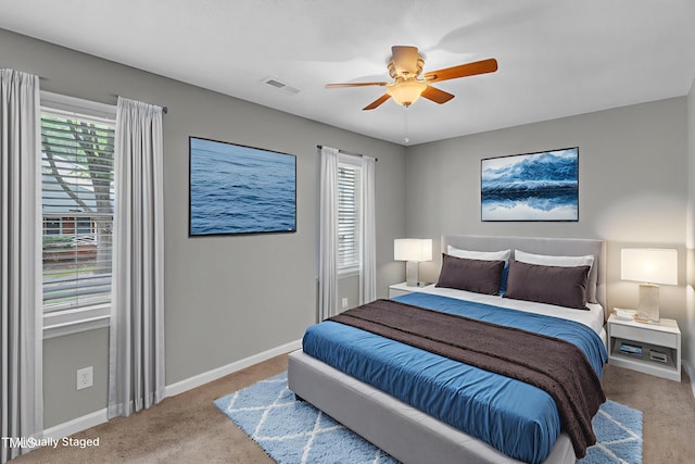 4658 Fawnbrook Cir, Raleigh, NC 27612 - carpeted bedroom featuring baseboards and a ceiling fan