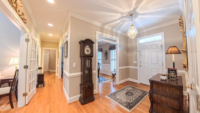 119 Georgetowne Dr, Elon, NC 27244 - foyer entrance with light wood-style flooring, ornamental molding, baseboards, and recessed lighting