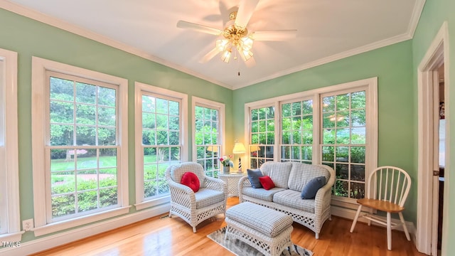 119 Georgetowne Dr, Elon, NC 27244 - sunroom featuring plenty of natural light, wood finished floors, ornamental molding, and french doors
