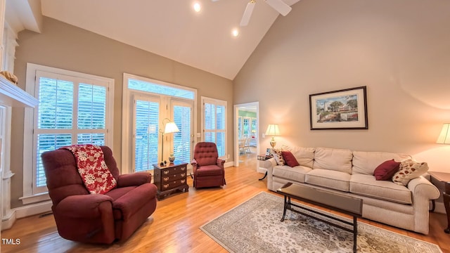 119 Georgetowne Dr, Elon, NC 27244 - living area with healthy amount of natural light, high vaulted ceiling, light wood finished floors, ceiling fan, and recessed lighting