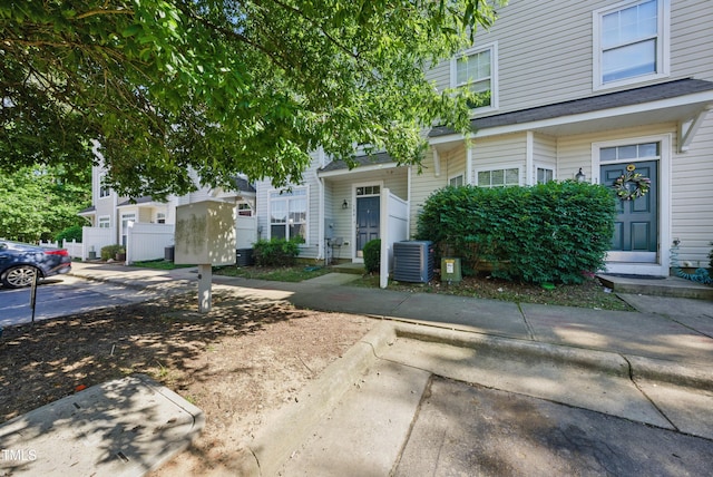8621 Neuse Club Ln Unit 106, Raleigh, NC 27616 - view of front of property featuring cooling unit