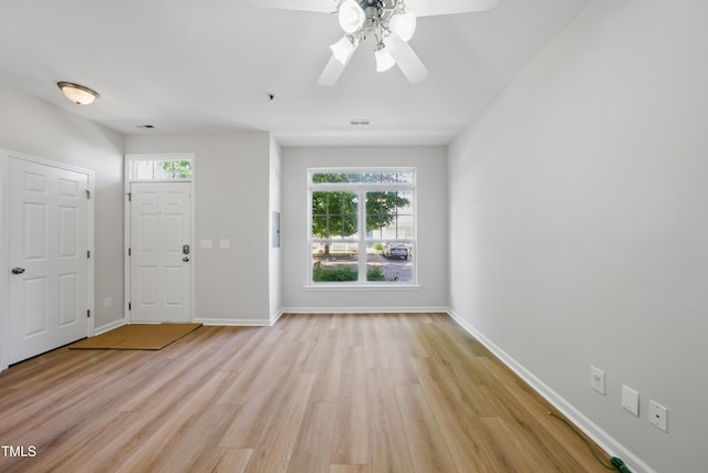 8621 Neuse Club Ln Unit 106, Raleigh, NC 27616 - entryway featuring light wood-style floors, baseboards, and a ceiling fan