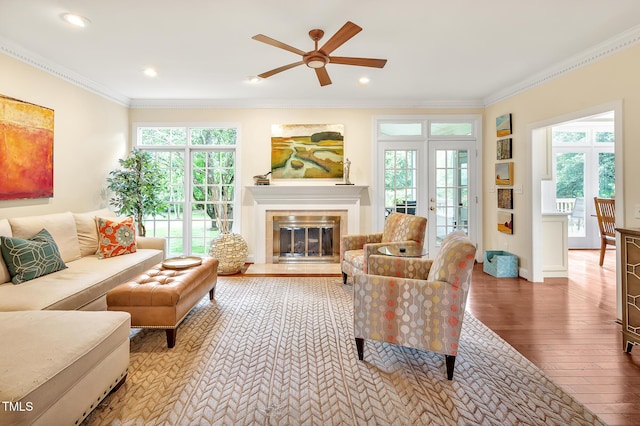 14 Marigold Pl, Durham, NC 27705 - living area with hardwood / wood-style flooring, ceiling fan, ornamental molding, a glass covered fireplace, and recessed lighting