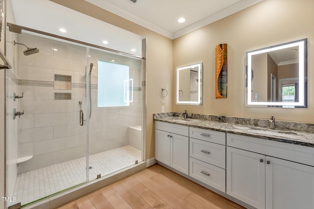 14 Marigold Pl, Durham, NC 27705 - full bathroom featuring crown molding, a shower stall, double vanity, recessed lighting, and wood finished floors