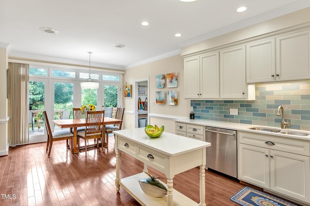 14 Marigold Pl, Durham, NC 27705 - kitchen featuring stainless steel dishwasher, a sink, light countertops, tasteful backsplash, and crown molding