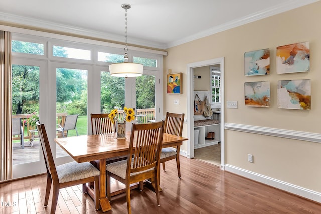 14 Marigold Pl, Durham, NC 27705 - dining space featuring light wood-style flooring, ornamental molding, and baseboards
