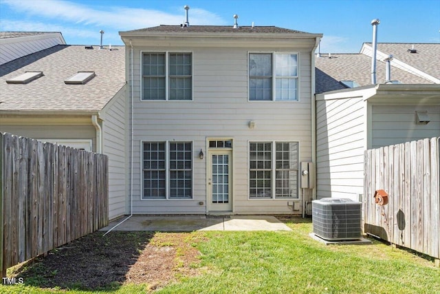 2822 Pickett Rd Unit 132, Durham, NC 27705 - rear view of house with central AC, a patio area, and roof with shingles