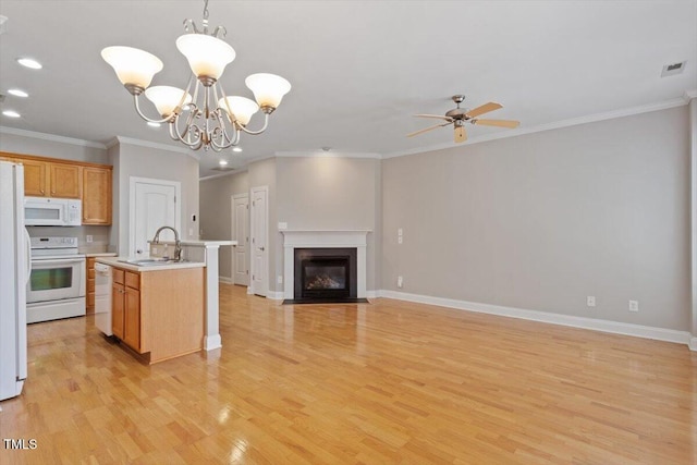 2822 Pickett Rd Unit 132, Durham, NC 27705 - kitchen with white appliances, open floor plan, light countertops, ceiling fan, and light wood-type flooring