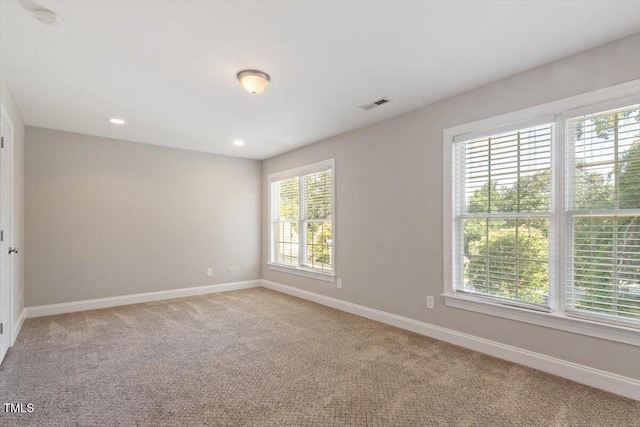 2822 Pickett Rd Unit 132, Durham, NC 27705 - unfurnished room with light colored carpet, baseboards, a smoke detector, and recessed lighting