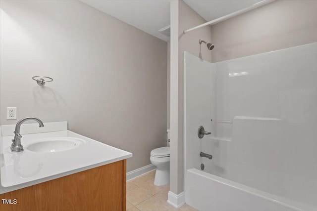 2822 Pickett Rd Unit 132, Durham, NC 27705 - full bathroom with toilet, tile patterned flooring, vanity, shower / washtub combination, and baseboards