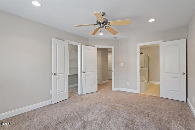 2822 Pickett Rd Unit 132, Durham, NC 27705 - unfurnished bedroom with light carpet, a spacious closet, recessed lighting, baseboards, and a closet