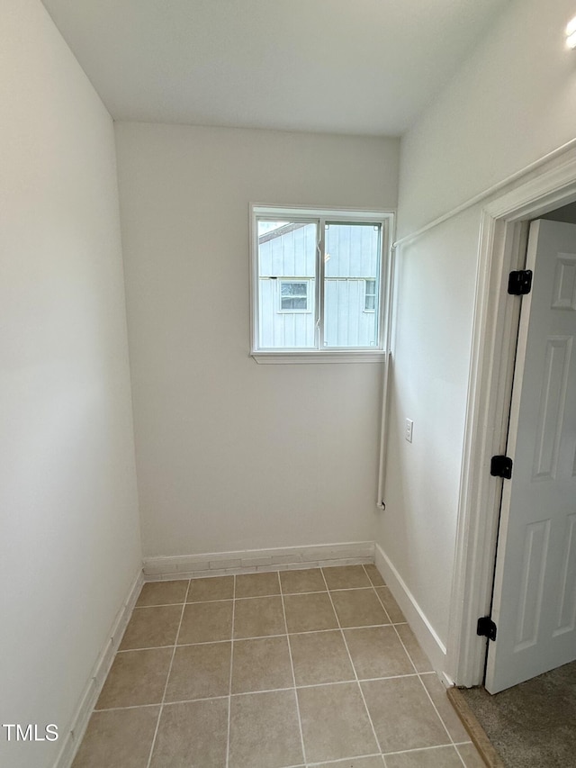2909 Sprucewood Dr, Durham, NC 27707 - empty room featuring baseboards and light tile patterned floors