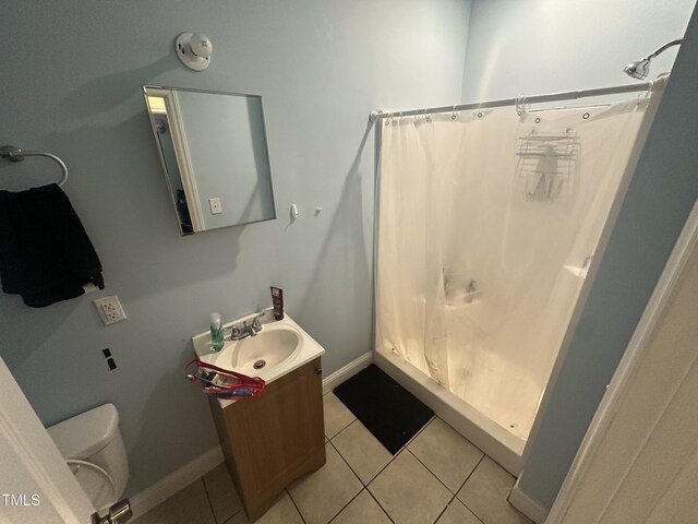 2509 Chapel Hill Rd, Durham, NC 27707 - full bath with vanity, a shower with curtain, tile patterned flooring, and toilet