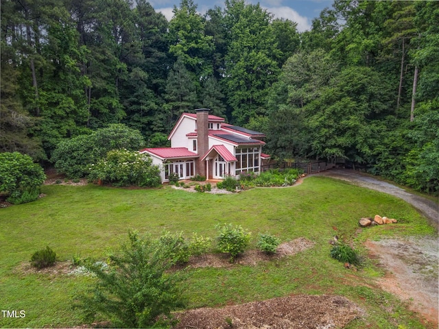 145 Ryan Rd, Pittsboro, NC 27312 - aerial view of property and surrounding area with a heavily wooded area