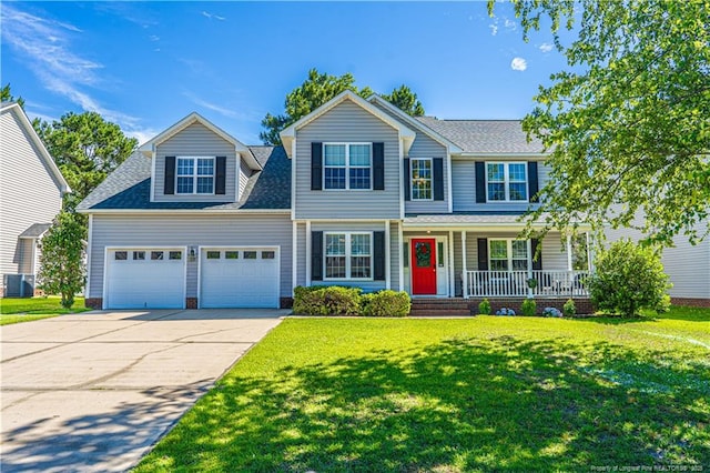 191 Trenton Pl, Cameron, NC 28326 - traditional-style home featuring covered porch, concrete driveway, a garage, a front lawn, and central air condition unit