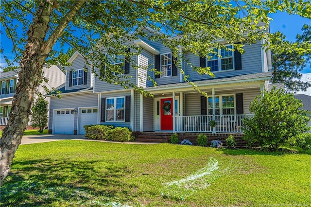 191 Trenton Pl, Cameron, NC 28326 - view of front of home featuring covered porch, driveway, a front lawn, and a garage