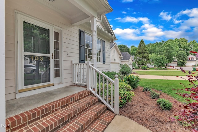 103 Kylie Savannah Ct, Cary, NC 27511 - doorway to property with a yard