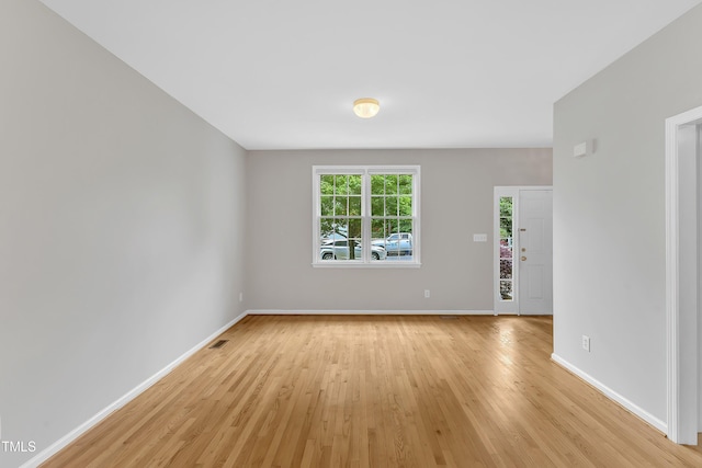 103 Kylie Savannah Ct, Cary, NC 27511 - unfurnished room with light wood finished floors and baseboards