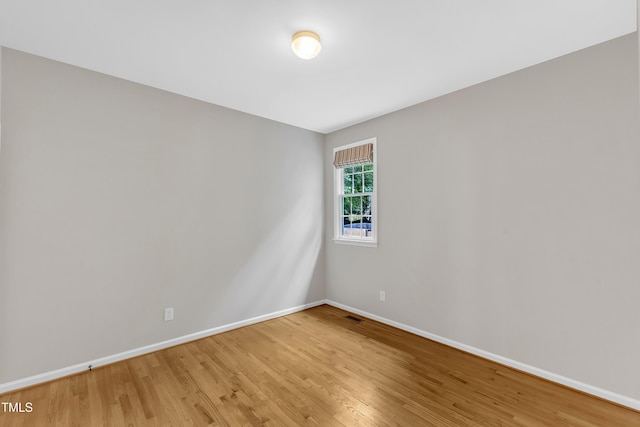 103 Kylie Savannah Ct, Cary, NC 27511 - spare room with wood finished floors and baseboards