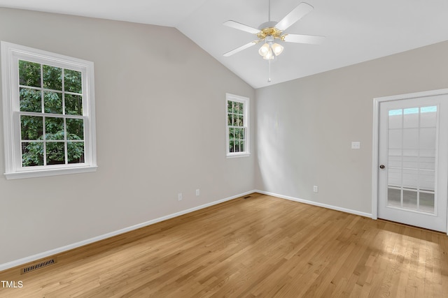 103 Kylie Savannah Ct, Cary, NC 27511 - unfurnished room with healthy amount of natural light, light wood-type flooring, vaulted ceiling, ceiling fan, and baseboards
