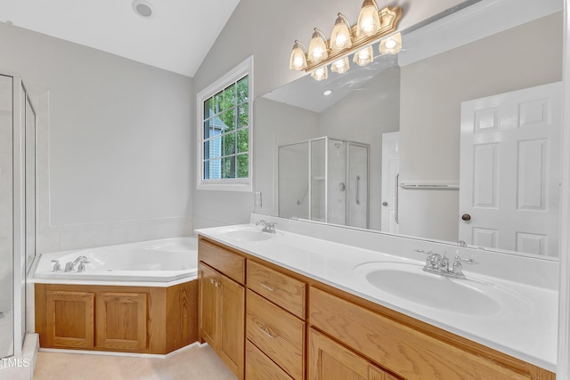 103 Kylie Savannah Ct, Cary, NC 27511 - full bath with vaulted ceiling, a stall shower, double vanity, a bath, and tile patterned flooring