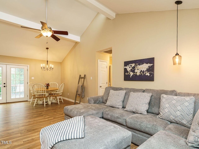 8204 Charlbert Ct, Apex, NC 27539 - living room with wood finished floors, beam ceiling, a ceiling fan, a chandelier, and baseboards