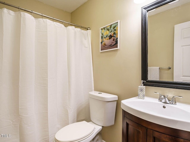 8204 Charlbert Ct, Apex, NC 27539 - bathroom featuring toilet, vanity, and a shower with curtain
