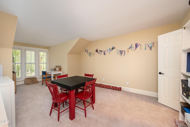 6035 Sentinel Dr, Raleigh, NC 27609 - dining space with light carpet and baseboards