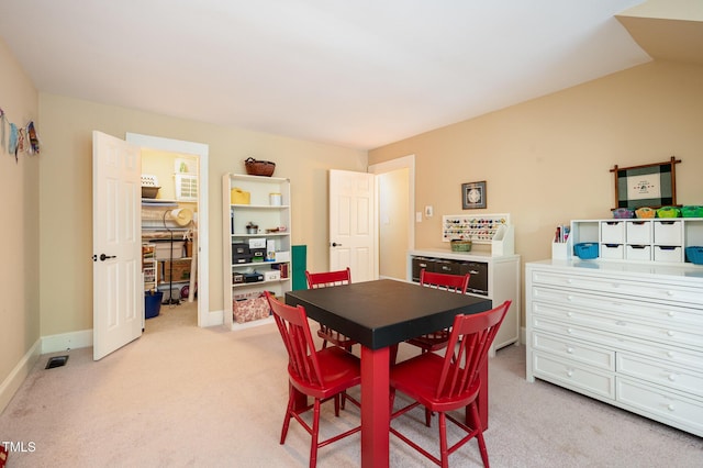 6035 Sentinel Dr, Raleigh, NC 27609 - dining room with light carpet and baseboards