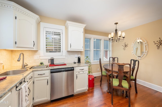 6035 Sentinel Dr, Raleigh, NC 27609 - kitchen featuring dishwasher, a chandelier, a sink, dark wood finished floors, and baseboards