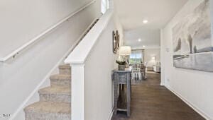 2132 Monk Dr, Haw River, NC 27258 - staircase featuring recessed lighting and wood finished floors