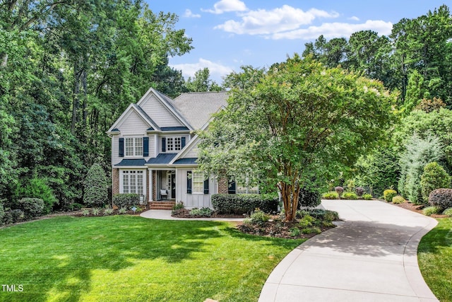 3748 Westbury Lake Dr, Raleigh, NC 27603 - craftsman-style house featuring a front yard, covered porch, a standing seam roof, a metal roof, and board and batten siding