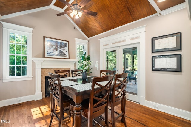3748 Westbury Lake Dr, Raleigh, NC 27603 - dining area featuring ceiling fan, wooden ceiling, a premium fireplace, wood finished floors, and vaulted ceiling