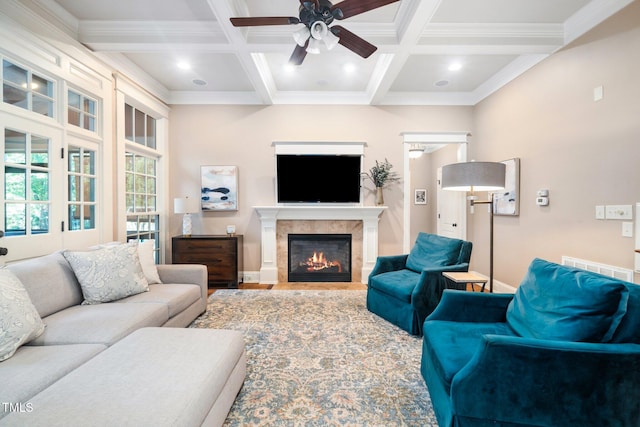 3748 Westbury Lake Dr, Raleigh, NC 27603 - living room featuring ceiling fan, coffered ceiling, beamed ceiling, crown molding, and a glass covered fireplace