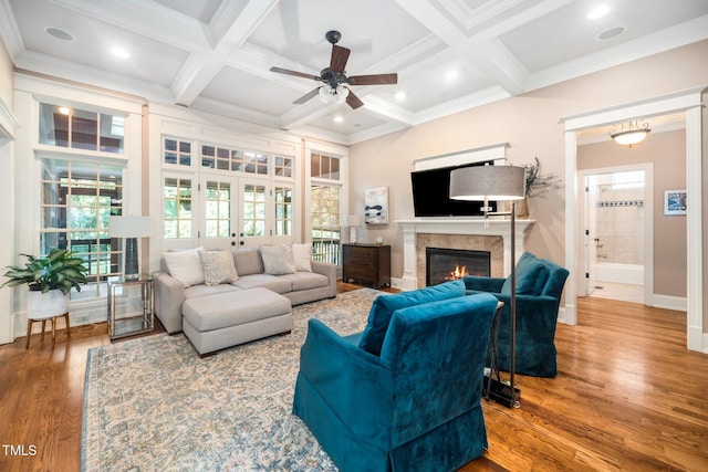 3748 Westbury Lake Dr, Raleigh, NC 27603 - living room featuring ceiling fan, french doors, coffered ceiling, wood finished floors, and beam ceiling
