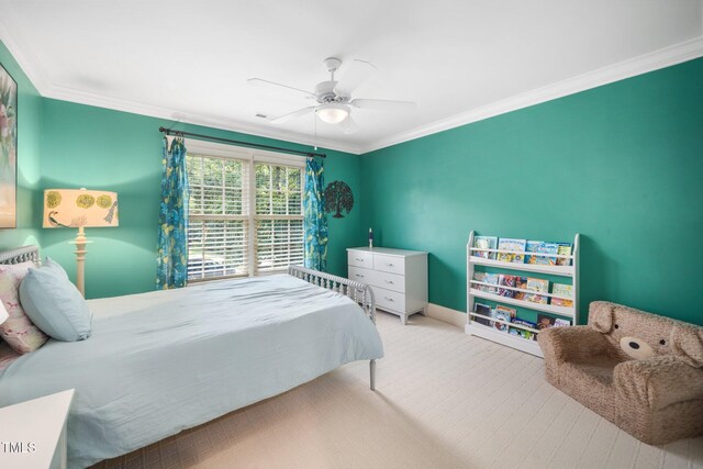 3748 Westbury Lake Dr, Raleigh, NC 27603 - carpeted bedroom with crown molding and ceiling fan