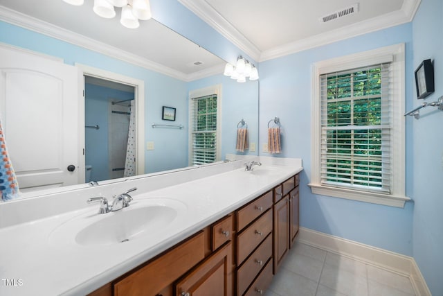 3748 Westbury Lake Dr, Raleigh, NC 27603 - full bath featuring double vanity, plenty of natural light, tile patterned floors, crown molding, and curtained shower
