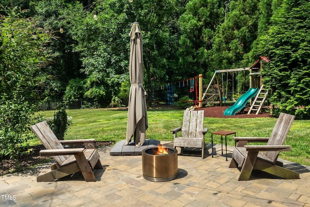 3748 Westbury Lake Dr, Raleigh, NC 27603 - view of patio featuring an outdoor fire pit and a playground