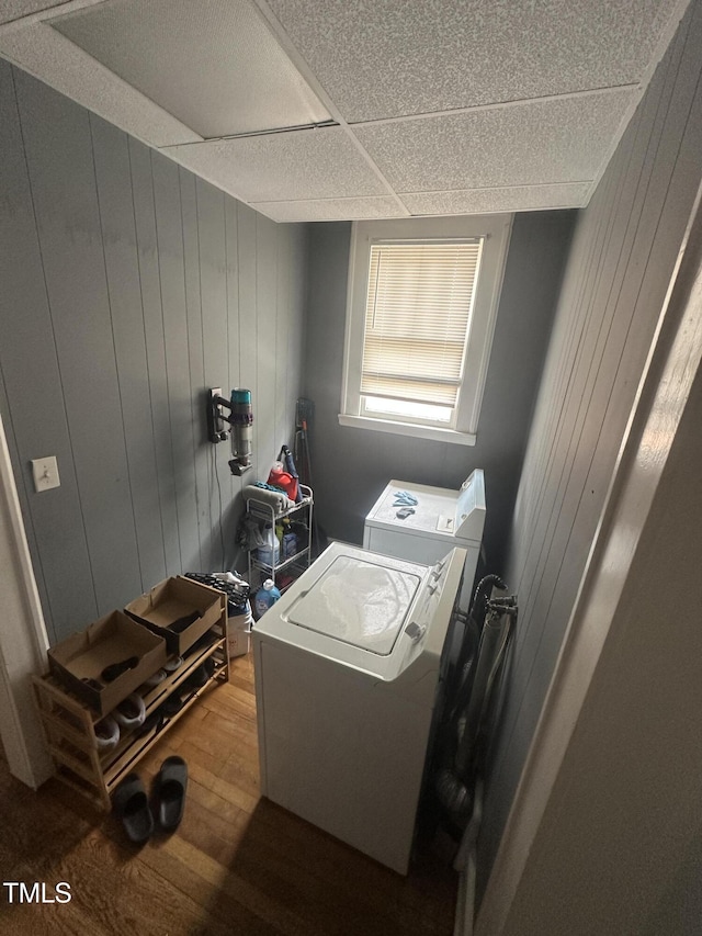 2511 Chapel Hill Rd, Durham, NC 27707 - laundry room featuring dark wood-type flooring, independent washer and dryer, and wood walls