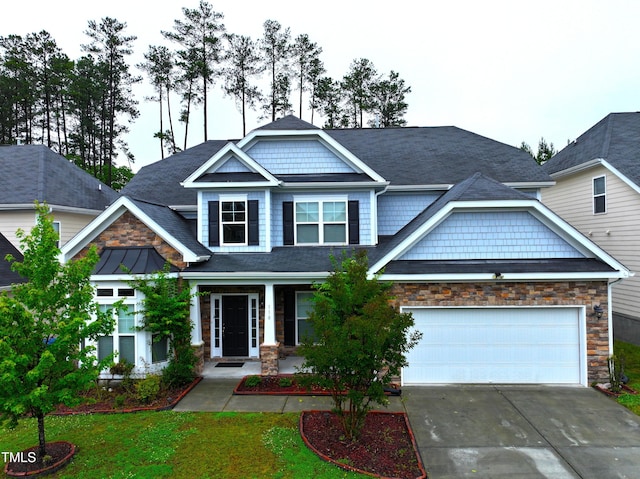110 Elmsford St, Durham, NC 27707 - craftsman house featuring concrete driveway, an attached garage, stone siding, and a front lawn
