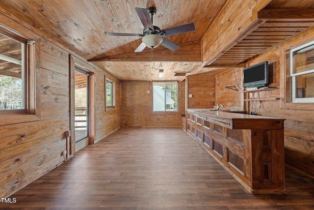 5437 Grasshopper Rd, Raleigh, NC 27610 - unfurnished living room featuring wood ceiling with exposed beams, wooden walls, dark wood-type flooring, and a ceiling fan