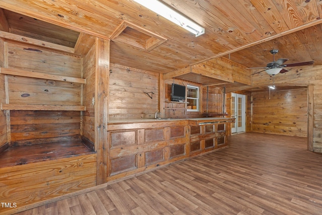 5437 Grasshopper Rd, Raleigh, NC 27610 - empty room featuring wood ceiling, wood walls, wood finished floors, and ceiling fan