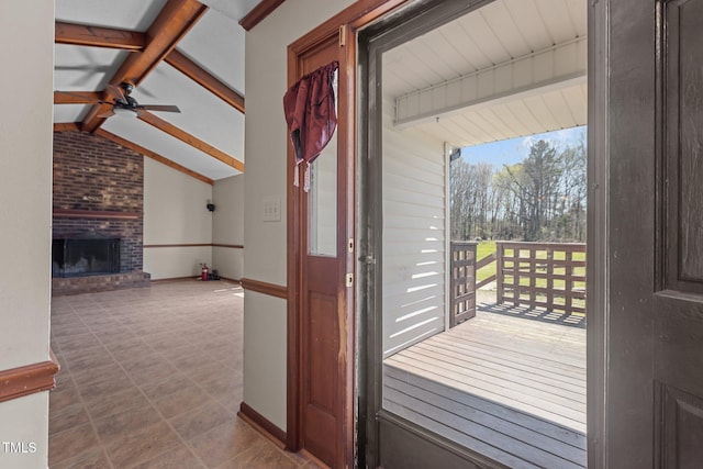 5437 Grasshopper Rd, Raleigh, NC 27610 - foyer entrance with a ceiling fan, a fireplace, and baseboards