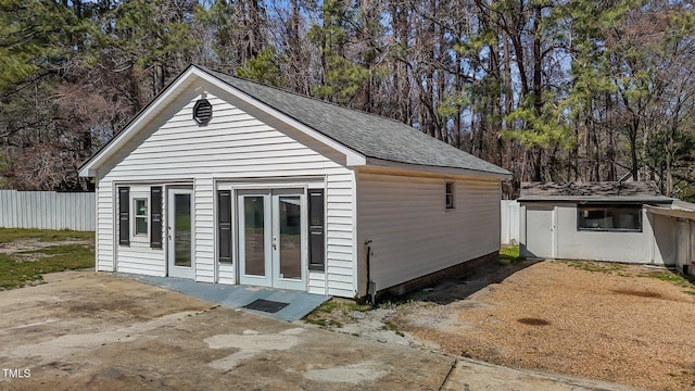 5437 Grasshopper Rd, Raleigh, NC 27610 - view of outdoor structure with french doors and view of wooded area