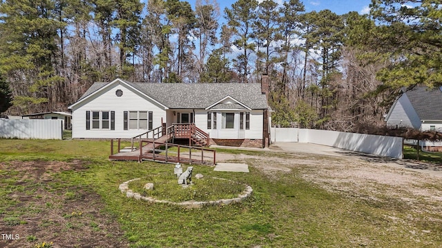 5437 Grasshopper Rd, Raleigh, NC 27610 - view of front of house with a chimney and a shingled roof