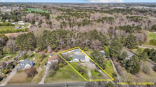 5437 Grasshopper Rd, Raleigh, NC 27610 - aerial view of property and surrounding area with property parcel outlined and a forest