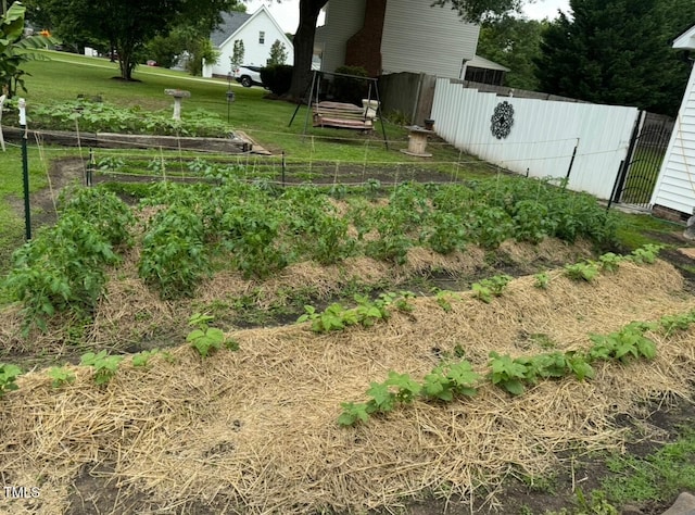 5437 Grasshopper Rd, Raleigh, NC 27610 - view of yard featuring a vegetable garden